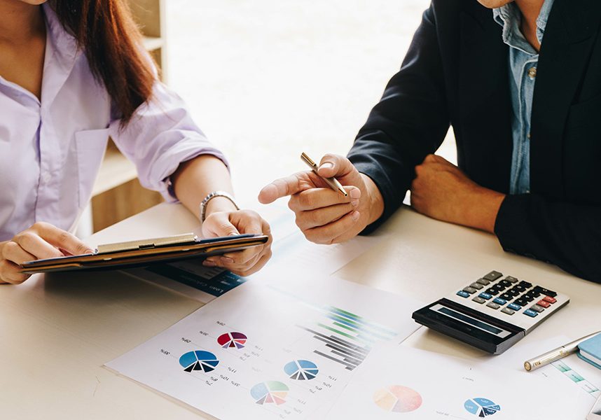 Business people meeting to analyze and discuss the situation on Business people meeting to analyze and discuss the situation on the financial report in meeting room. Meeting planning budget and cost. Business financial analysis and strategy concept.