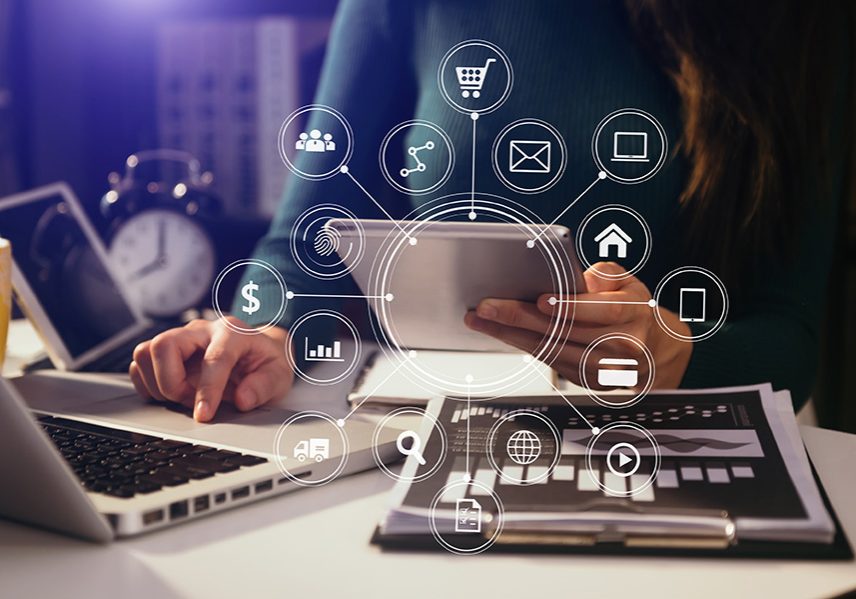 Businesswoman working with smart phone and laptop and digital t Businesswoman working with smart phone and laptop and digital tablet computer in office with digital marketing media in virtual icon at office