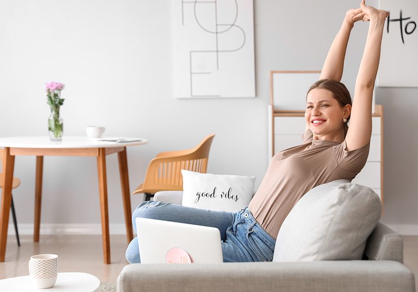 Businesswoman relaxing on sofa before weekends at home Businesswoman relaxing on sofa before weekends at home